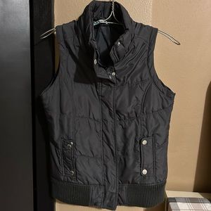 Charcoal vest.  Size small.  Maurice’s brand.  Good used condition.